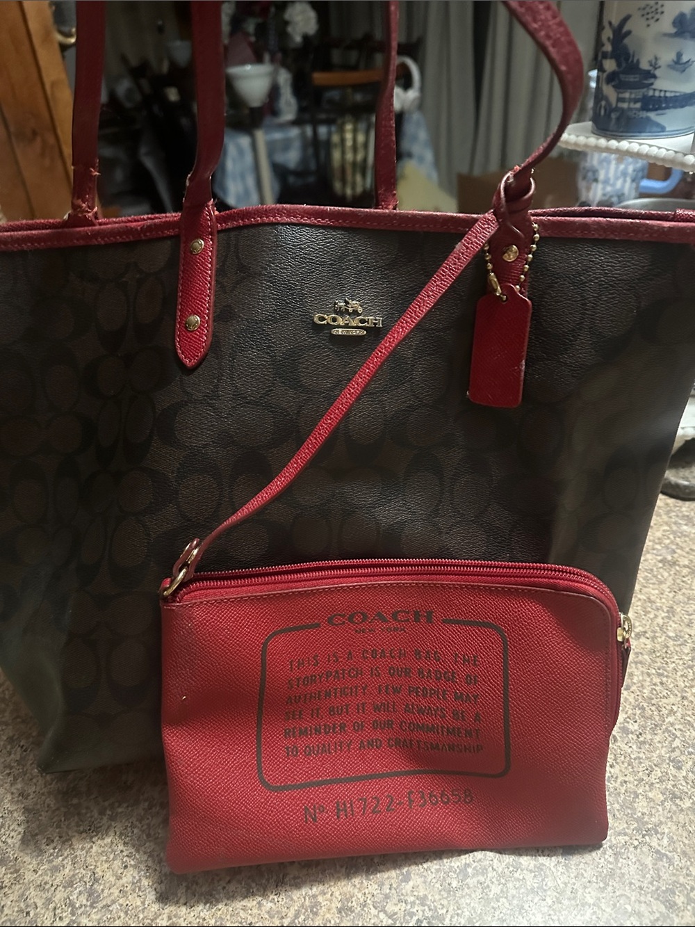 Coach Brown Signature Tote with Red Leather Trim and Red Pouch. Needs some love